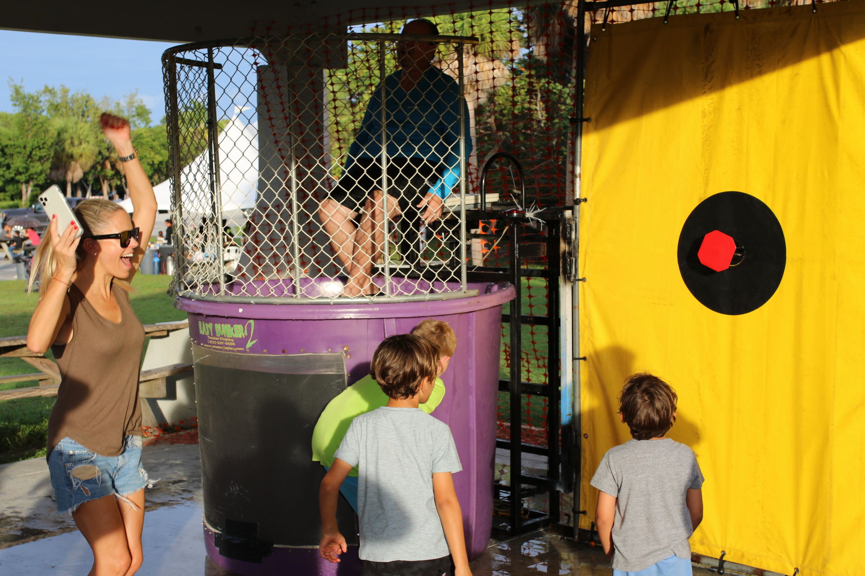 Kids rejoyce dunking Justo Rey from Islander News